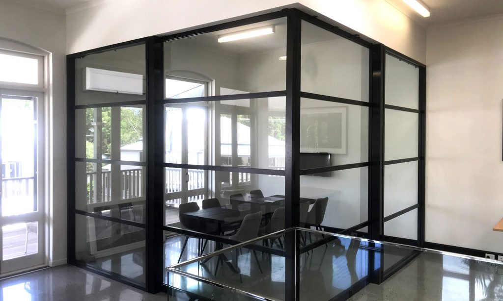 office space glazing options with sliding glass panels